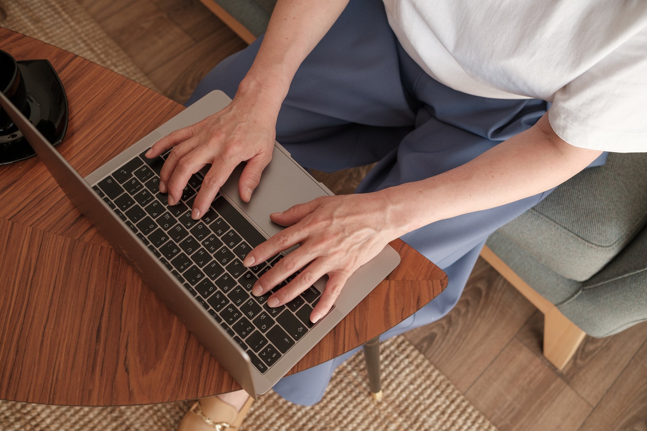 Female Therapist Using Laptop Computer on the Table