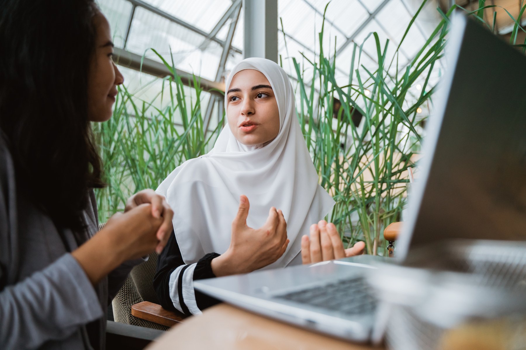 Arab Muslim Woman in Conversation