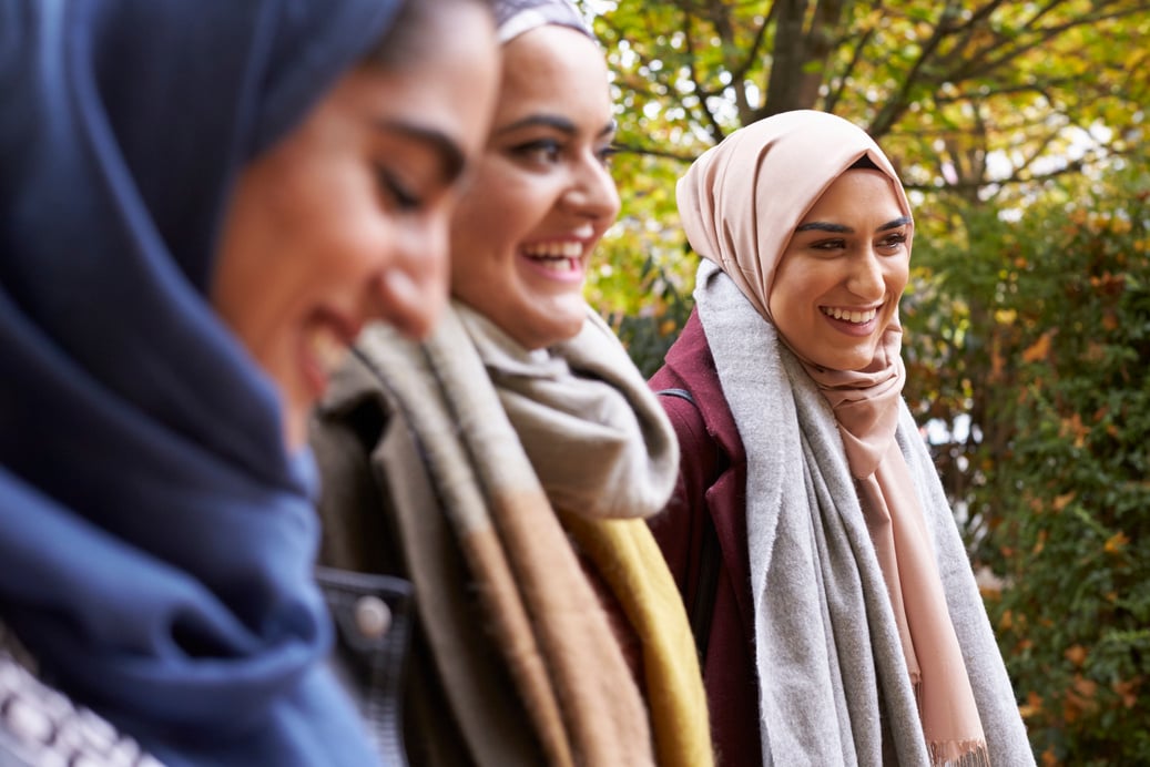 British Muslim Female Friends Meeting in Urban Environment